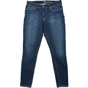 Signature Levi’s Strauss size 32 blue distressed stretchy skinny jeans like new